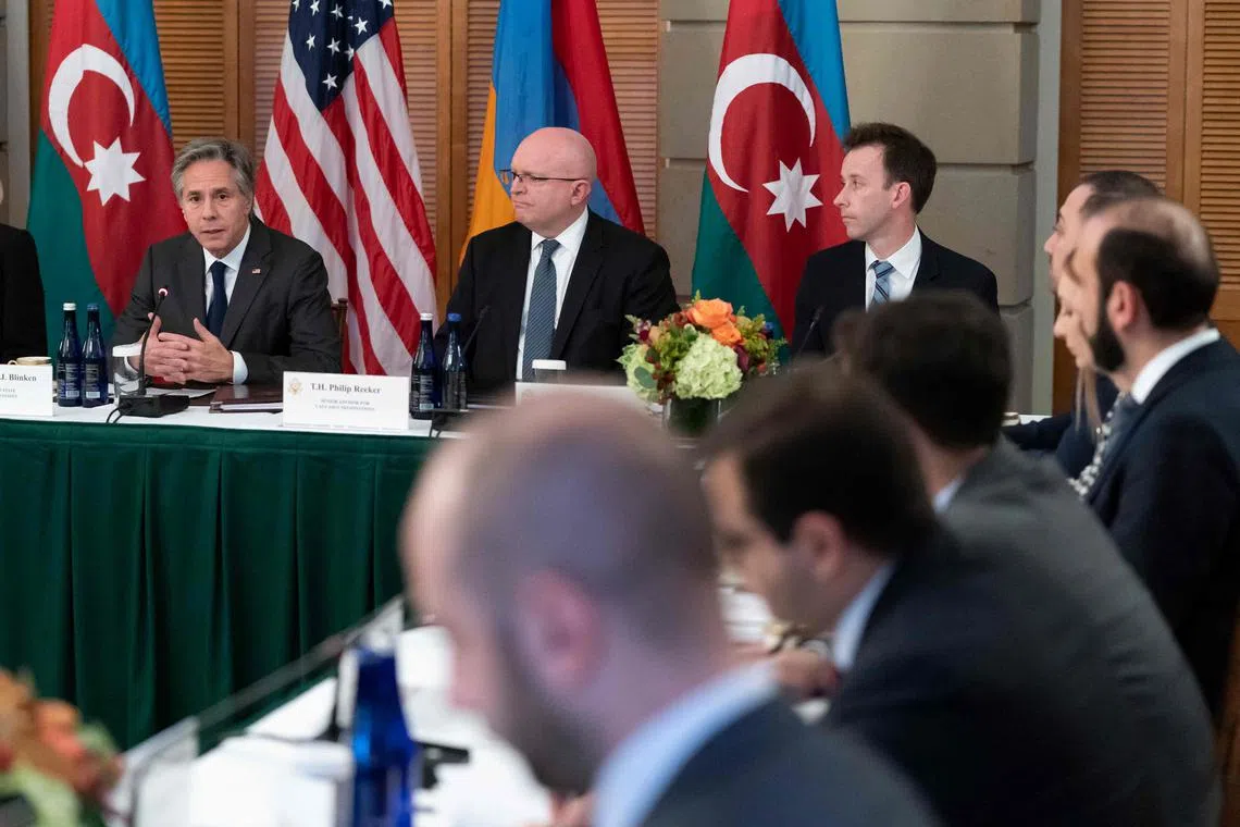US Secretary of State Antony Blinken (far left) speaking during a meeting with Azerbaijan's Foreign Minister Jeyhun Bayramov and Armenia's Foreign Minister Ararat Mirzoyan at Blair House, Nov 7, 2022, in Washington.