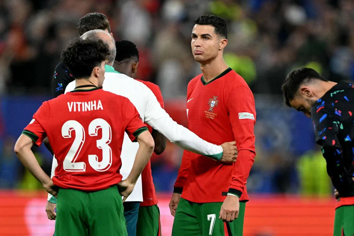 Portugal's players were deployed as a supporting cast around Ronaldo (centre), so the forward could get another shot at glory in Euro 2024.