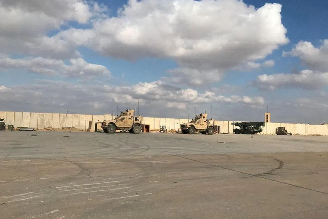 FILE PHOTO: Military vehicles of U.S. soldiers are seen at the al-Asad air base in Anbar province, Iraq, January 13, 2020. REUTERS/John Davison/File Photo