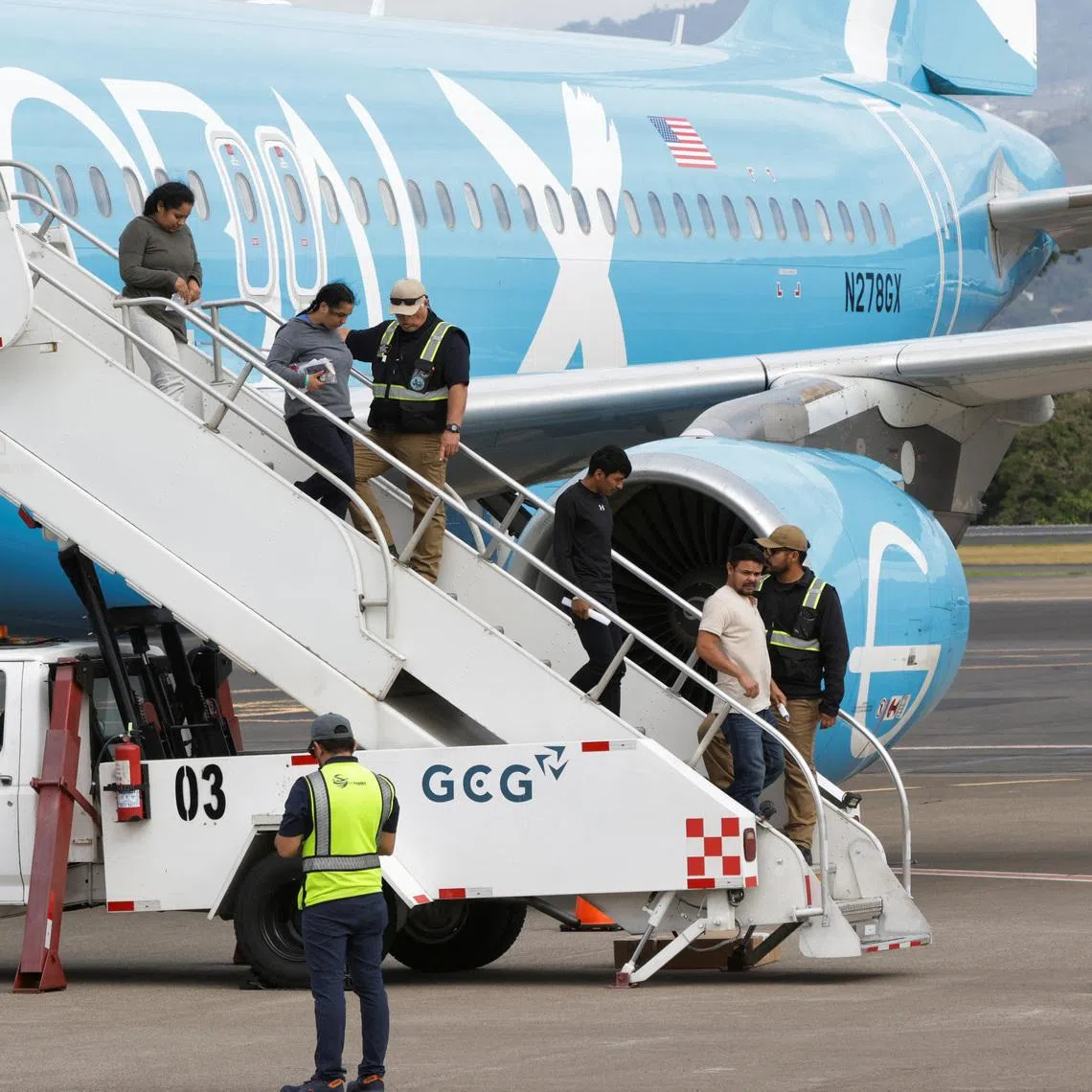 Costa Rican authorities receive a flight carrying 25 people deported from the U.S., all nationals of third countries, under an agreement to accept such deportees, at the Juan Santamaria International Airport, near Alajuela, Costa Rica, April 11, 2026. REUTERS/Mayela Lopez
