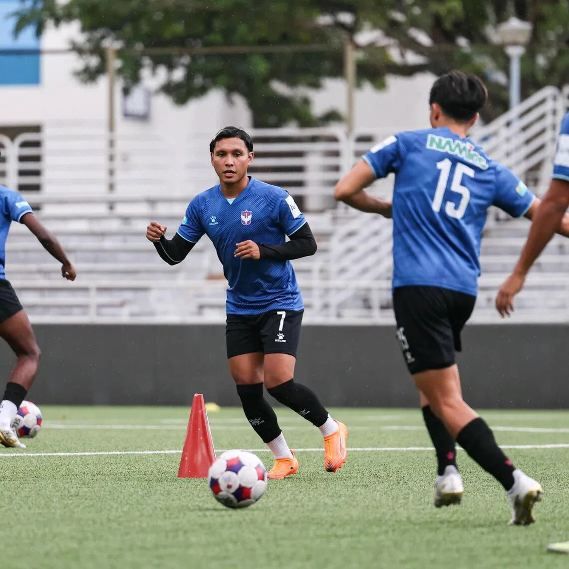 Albirex Niigata loanee Zulqarnaen Suzliman (centre) training with teammates at Jurong East Stadium on Jan 29.