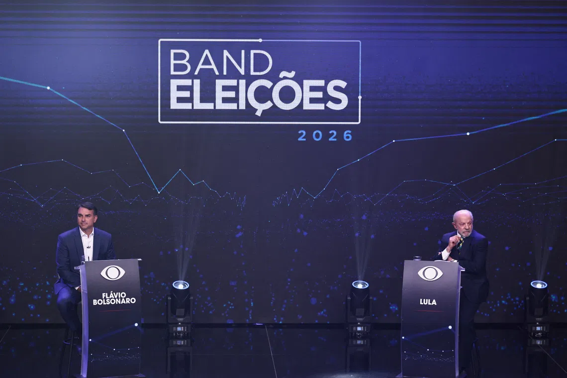 Brazilian presidential candidates Flavio Bolsonaro and Luiz Inacio Lula da Silva attend a presidential debate, ahead of the runoff presidential election, in Sao Paulo, Brazil, October 18, 2026. REUTERS/Jean Carniel