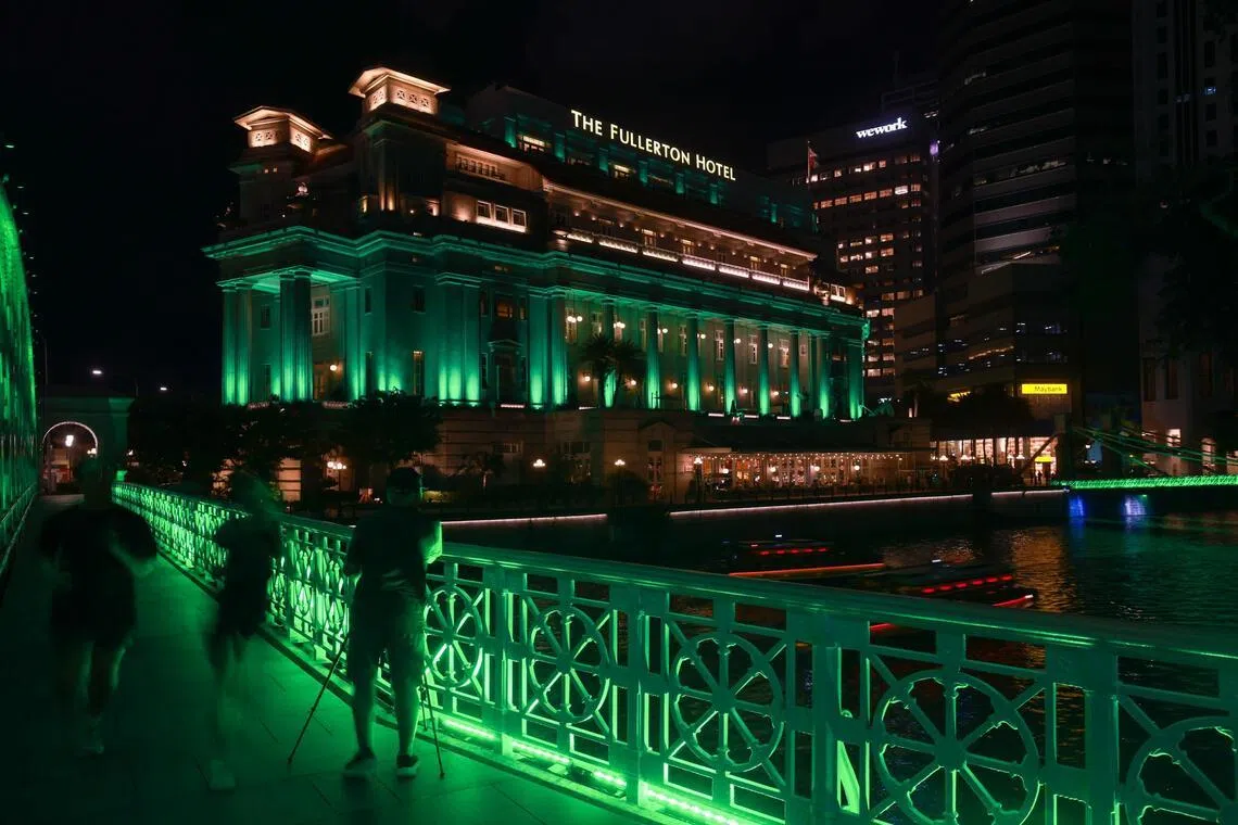 Fullerton Hotel and Anderson Bridge were among the iconic structures illuminated in green and white from 7.30pm to midnight.