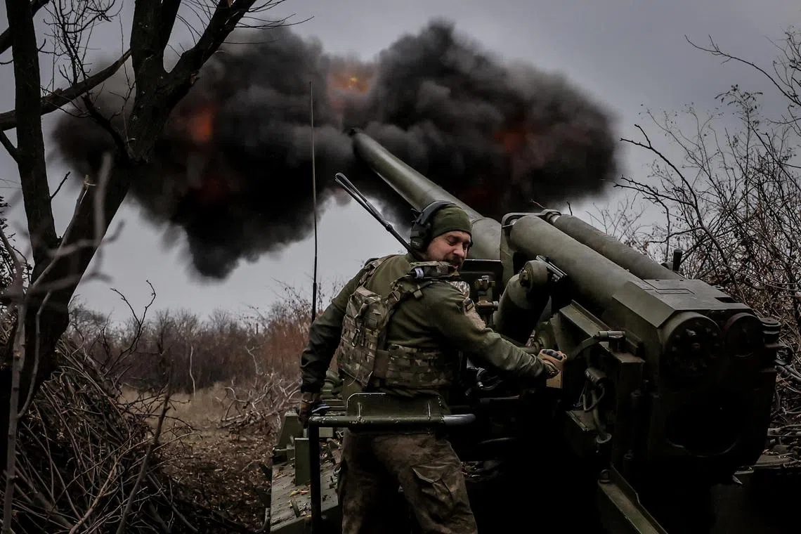 A Ukrainian serviceman fires a self-propelled howitzer towards Russian troops at a front line position near the town of Chasiv Yar, in Ukraine's Donetsk region, on Nov 18.
