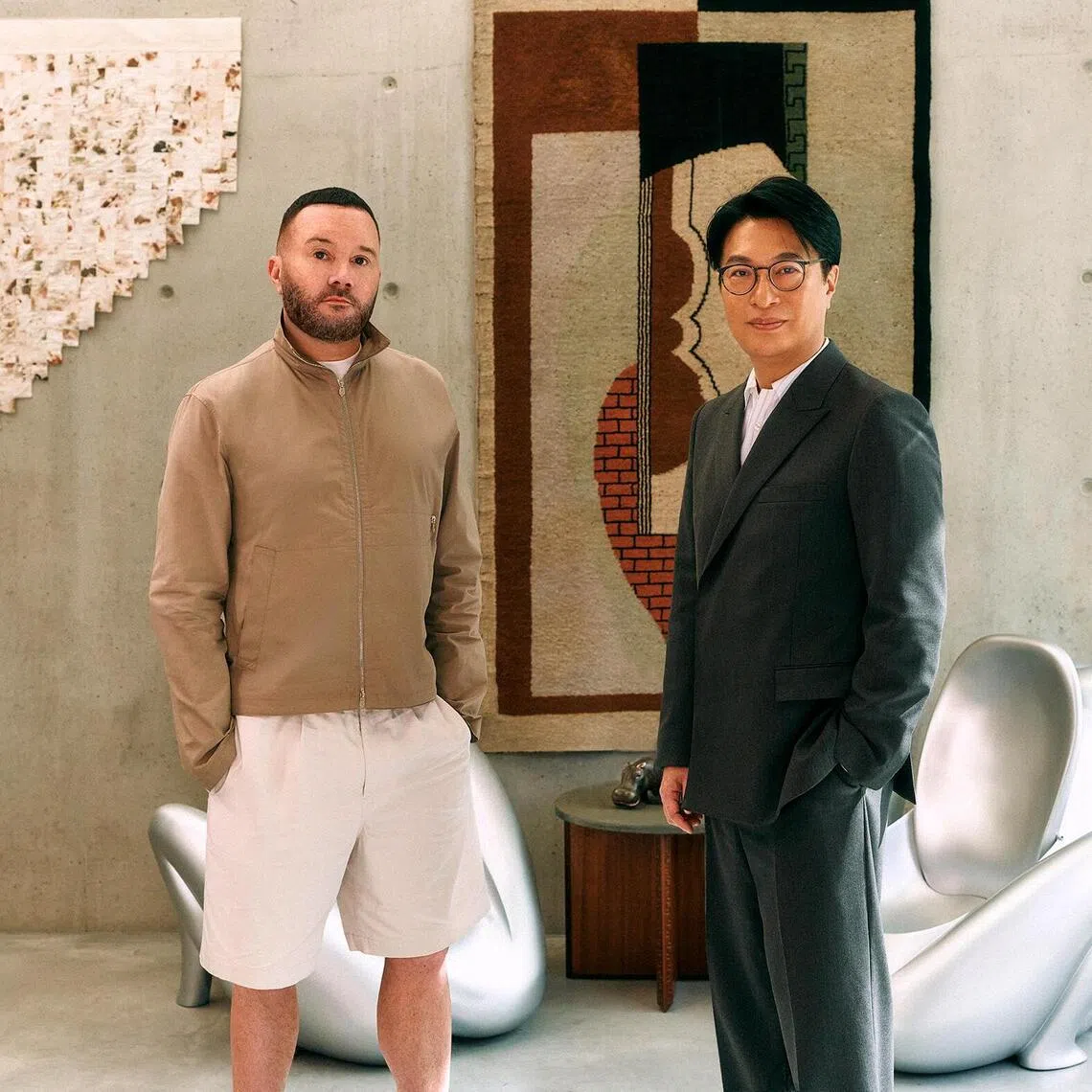 Chairman of Henderson Land Dr Martin Lee Ka-shing (right) and Kim Jones OBE, who announced his eponymous label on Oct 12.
