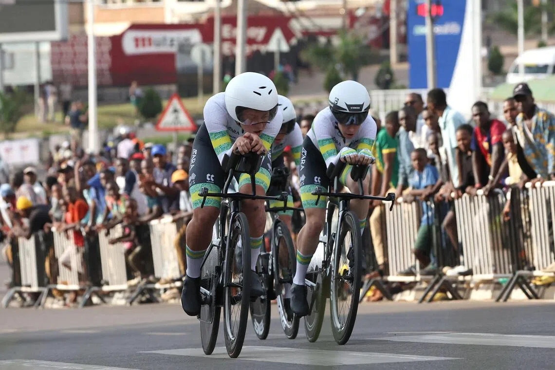 (From left) Australian riders Brodie Chapman, Amanda Spratt and Felicity Wilson-Haffenden competing in the team time trial mixed relay cycling event during the UCI Road World Championships, in Kigali, on Sept 24, 2025.