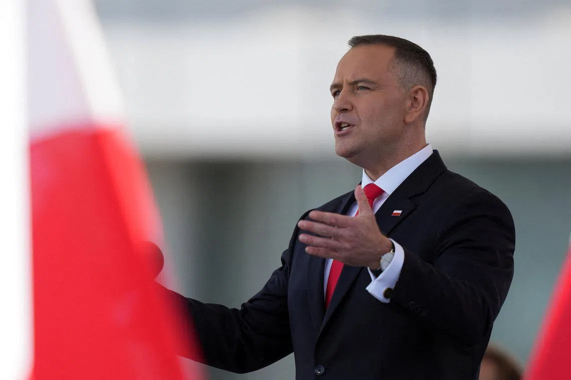 FILE PHOTO: Polish President Karol Nawrocki speaks as he attends the ceremony of accepting the sovereignty over the Armed Forces for the five-year term, in Warsaw, Poland, August 6, 2025. REUTERS/Aleksandra Szmigiel/File Photo