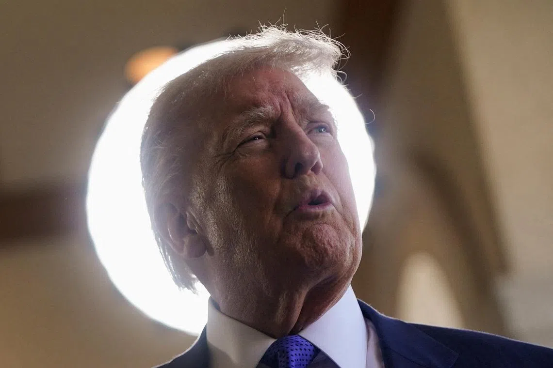 FILE PHOTO: U.S. President Donald Trump arrives ahead of the wedding of Dan Scavino, White House deputy chief of staff, and Erin Elmore, the director of Art in Embassies at the U.S. Department of State, at Mar-a-Lago in Palm Beach, Florida, U.S. February 1, 2026. REUTERS/Nathan Howard/File Photo