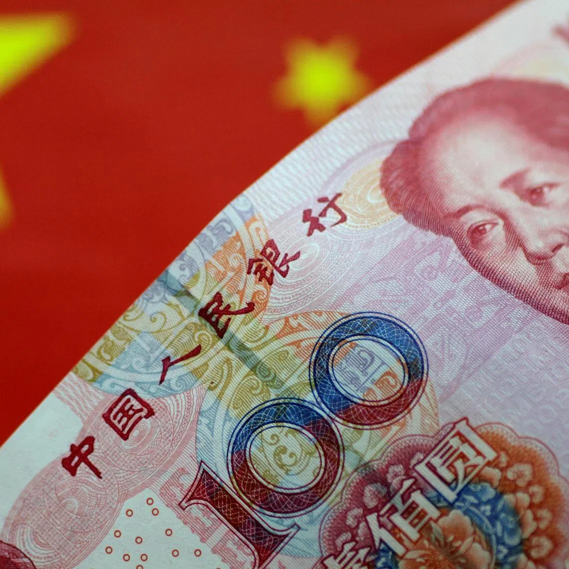 FILE PHOTO: A China yuan note is seen in this illustration photo May 31, 2017.     REUTERS/Thomas White/Illustration/File Photo