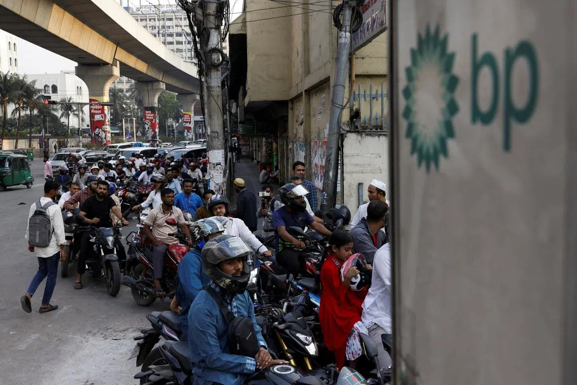 Vehicles queue at a fuel station, as concerns grow over fuel supplies following US-Israel conflict with Iran, in Dhaka, Bangladesh, on March 6.