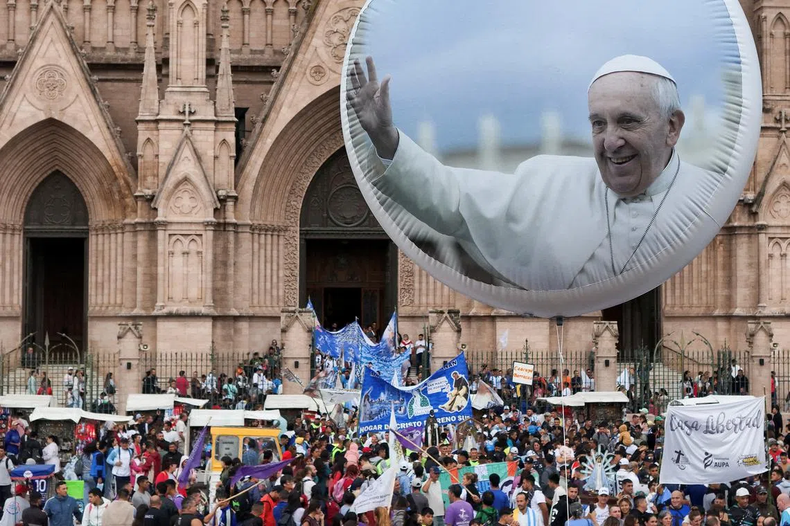 A drone view shows a balloon with the image of Pope Francis and the Lujan basilica during a Mass for the recovery of Pope Francis' health, in Buenos Aires, Argentina, March 16, 2025. REUTERS/Martin Cossarini