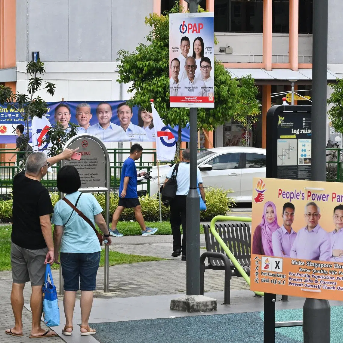 ST20250426-202547200335-Lim Yaohui-pixgeneric/

Flags, posters and banner of Tampines GRC candidates from People's Action Party (PAP), Workers' Party (WP) and People’s Power Party (PPP) near Block 823 Tampines Street 81 on April 26, 2025.   

Three opposition parties will duke it out in the quest to win Tampines GRC and unseat the incumbent PAP team led by Social and Family Development Minister Masagos Zulkifli. After successfully submitting their nomination papers at Poi Ching School in Tampines Street 71, the Workers' Party (WP), National Solidarity Party (NSP) and People’s Power Party (PPP) will go up against the People's Action Party (PAP) when Singaporeans go to the polls on May 3.

(ST PHOTO: LIM YAOHUI)