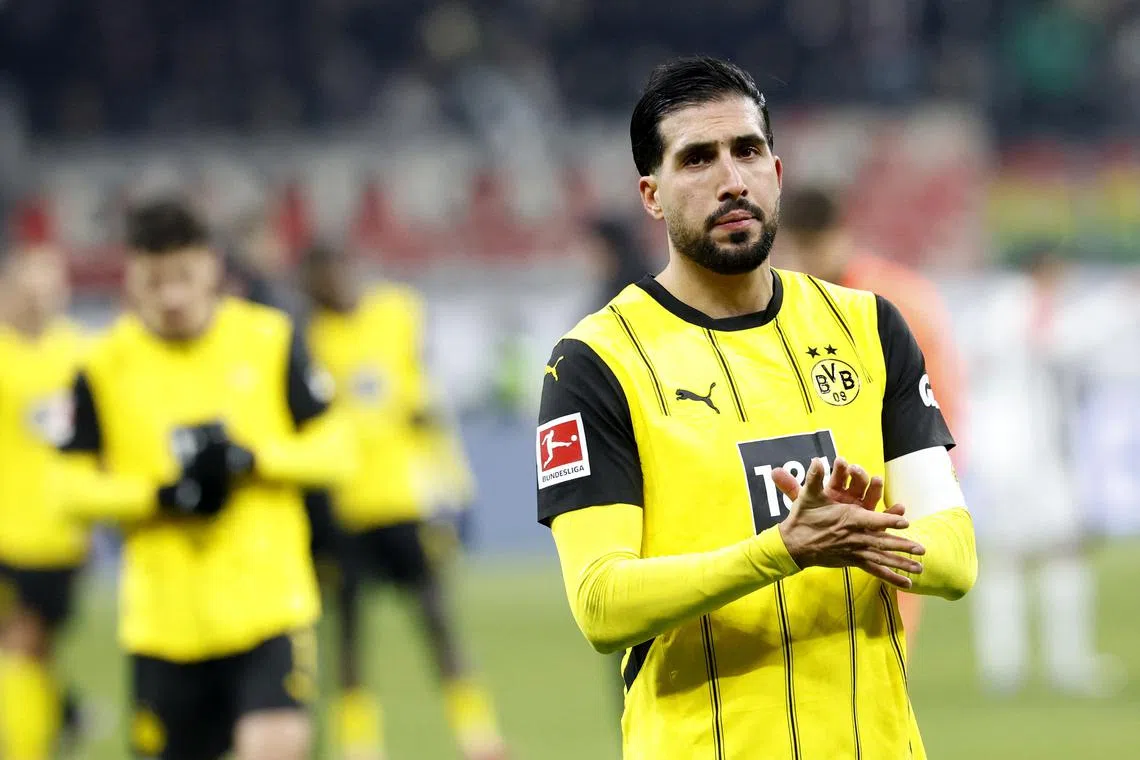 FILE PHOTO: Soccer Football - Bundesliga - Eintracht Frankfurt v Borussia Dortmund - Deutsche Bank Park, Frankfurt, Germany - January 17, 2025  Borussia Dortmund's Emre Can looks dejected after the match REUTERS/Heiko Becker/File Photo