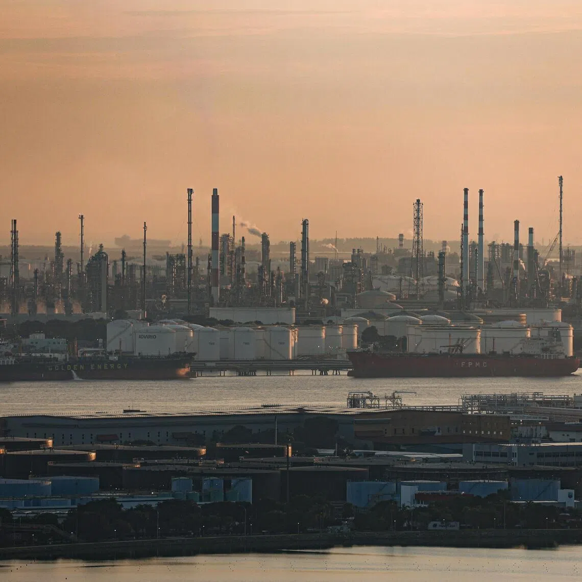 General view of refineries and petrochemical facilities on Jurong Island at sunset on April 6, 2026. Can be used for stories on economy, business, shipping, energy, global crisis, energy prices, oil, gas, US tariffs. ST PHOTO: BRIAN TEO
