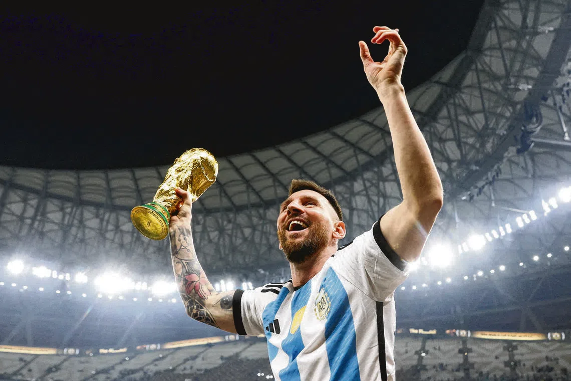 Argentina's Lionel Messi celebrates winning the World Cup in Doha, Qatar, in 2022.