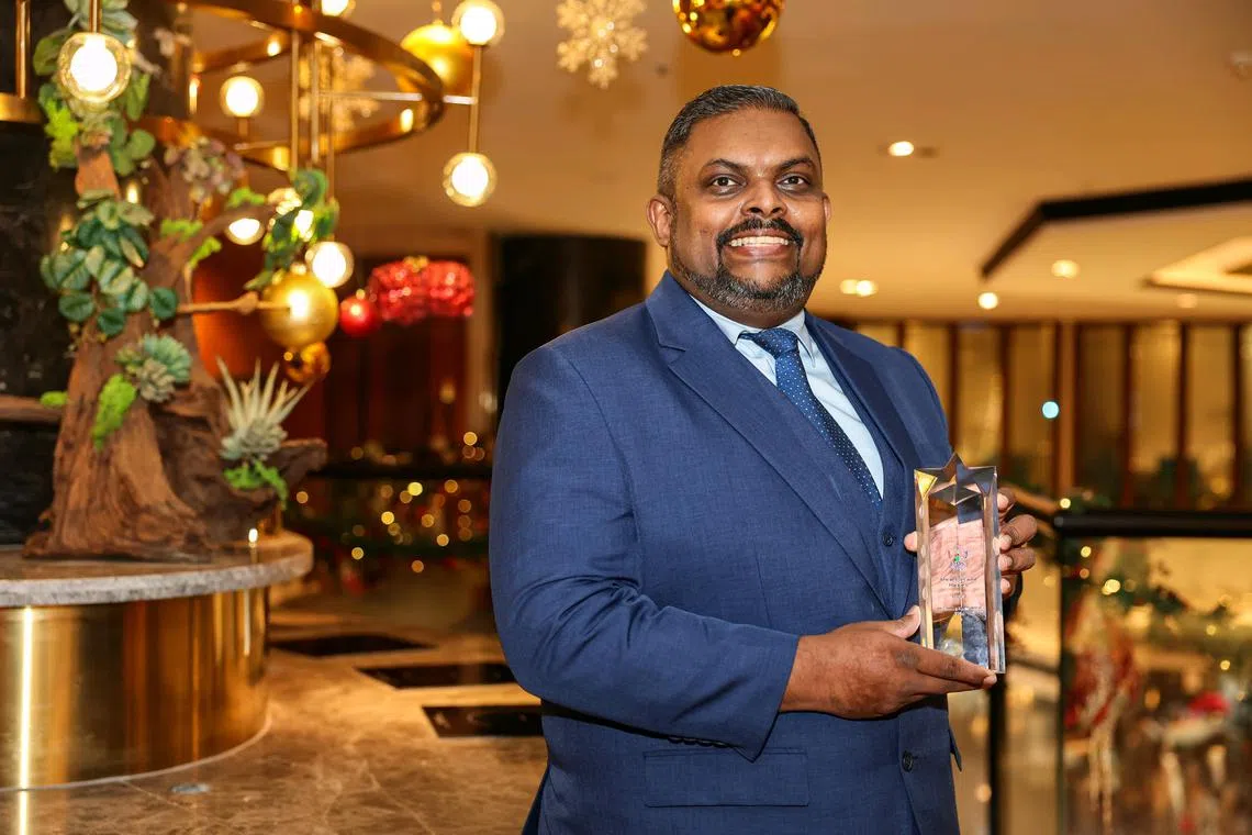 ST20241227_202472000625/zyaward27/Brian Teo/Zaihan Mohamed Yusof/Profile of Mr Mohamed Thasim, 48, Conrad Centennial Singapore director of safety and security, during the National Safety and Security Watch Group (NSSWG) award ceremony at Orchard Hotel on Dec 27, 2024. Mr Thasim is part of the Marina Bayfront Cluster, which has been nominated for the NSSWG?s outstanding cluster award. ST PHOTO: BRIAN TEO