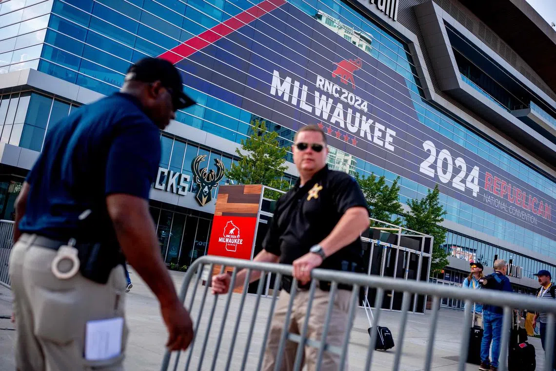 MILWAUKEE, WISCONSIN - JULY 13: Secret Service agents set up fencing outside the Fiserv Forum, which is scheduled to host the Republican National Convention (RNC), shortly after presumptive Republican presidential nominee former President Donald Trump was injured at a rally in Pennsylvania on July 13, 2024 in Milwaukee, Wisconsin. According to Butler County District Attorney Richard Goldinger, the suspected gunman is dead after grazing former President Trump with a bullet, killing one audience member and injuring at least one other.   Andrew Harnik/Getty Images/AFP (Photo by Andrew Harnik / GETTY IMAGES NORTH AMERICA / Getty Images via AFP)