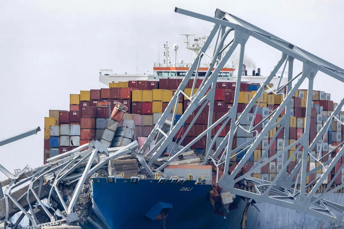 The cargo ship Dali sits in the water after running into and collapsing the Francis Scott Key Bridge on March 26, 2024 in Baltimore, Maryland. 