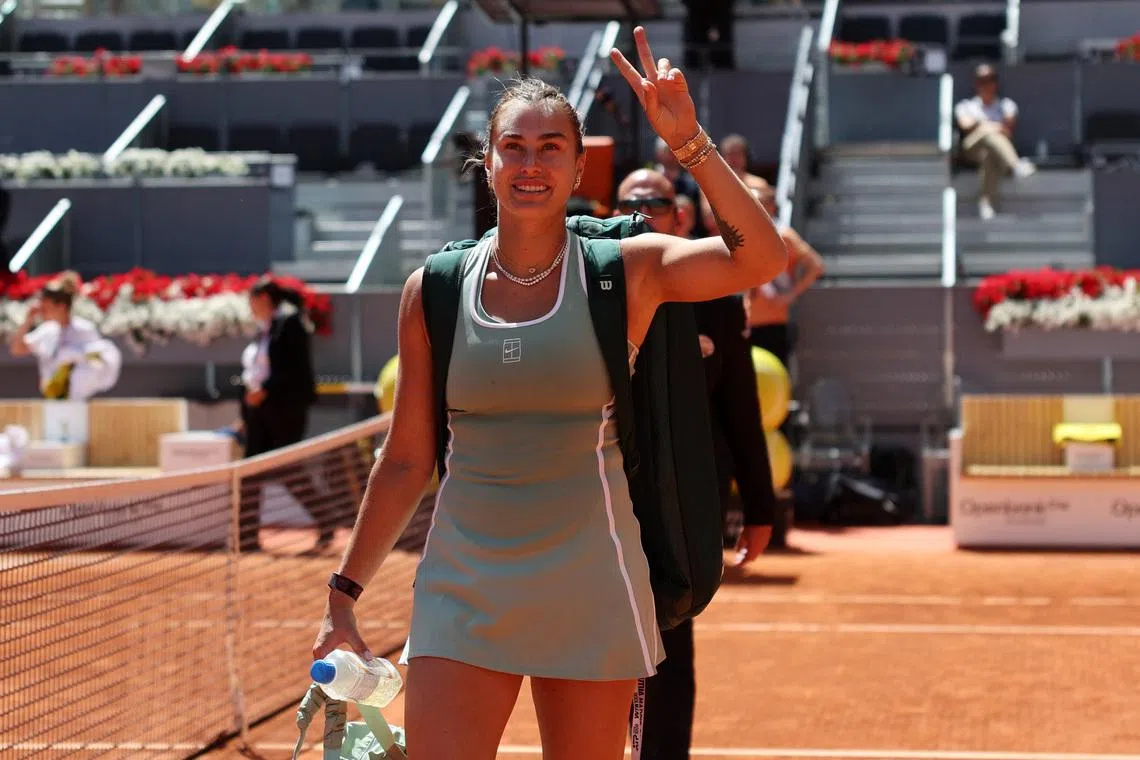 Tennis - Madrid Open - Park Manzanares, Madrid, Spain - April 27, 2026 Belarus' Aryna Sabalenka celebrates after winning her round of 16 match against Japan's Naomi Osaka REUTERS/Violeta Santos Moura