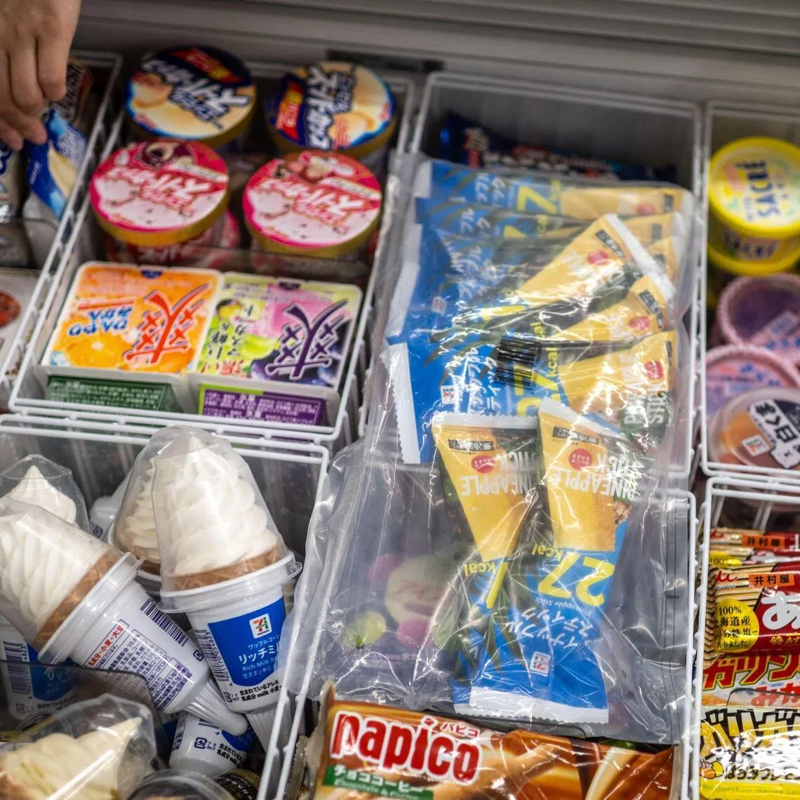 This illustrative picture shows ice cream in a convenience store in Tokyo on June 17, 2026. Summer is coming, a boom time for ice cream makers, but Japanese authorities have raided six major firms on suspicion of colluding to raise prices. (Photo by Philip FONG / AFP) 
