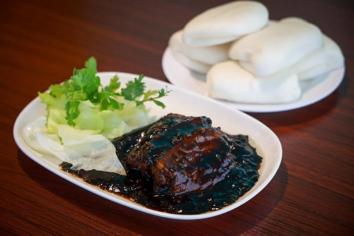 Westlake restaurant is known for its Braised Pork With Pau, or kong bak pau. 