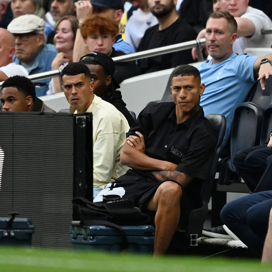 Soccer Football - Premier League - Tottenham Hotspur v Everton - Tottenham Hotspur Stadium, London, Britain - September 12, 2026 Tottenham Hotspur's Richarlison, Pedro Porro, Destiny Udogie and Wilson Odobert watch the match REUTERS/Dylan Martinez EDITORIAL USE ONLY. NO USE WITH UNAUTHORIZED AUDIO, VIDEO, DATA, FIXTURE LISTS, CLUB/LEAGUE LOGOS OR 'LIVE' SERVICES. ONLINE IN-MATCH USE LIMITED TO 120 IMAGES, NO VIDEO EMULATION. NO USE IN BETTING, GAMES OR SINGLE CLUB/LEAGUE/PLAYER PUBLICATIONS. PLEASE CONTACT YOUR ACCOUNT REPRESENTATIVE FOR FURTHER DETAILS..