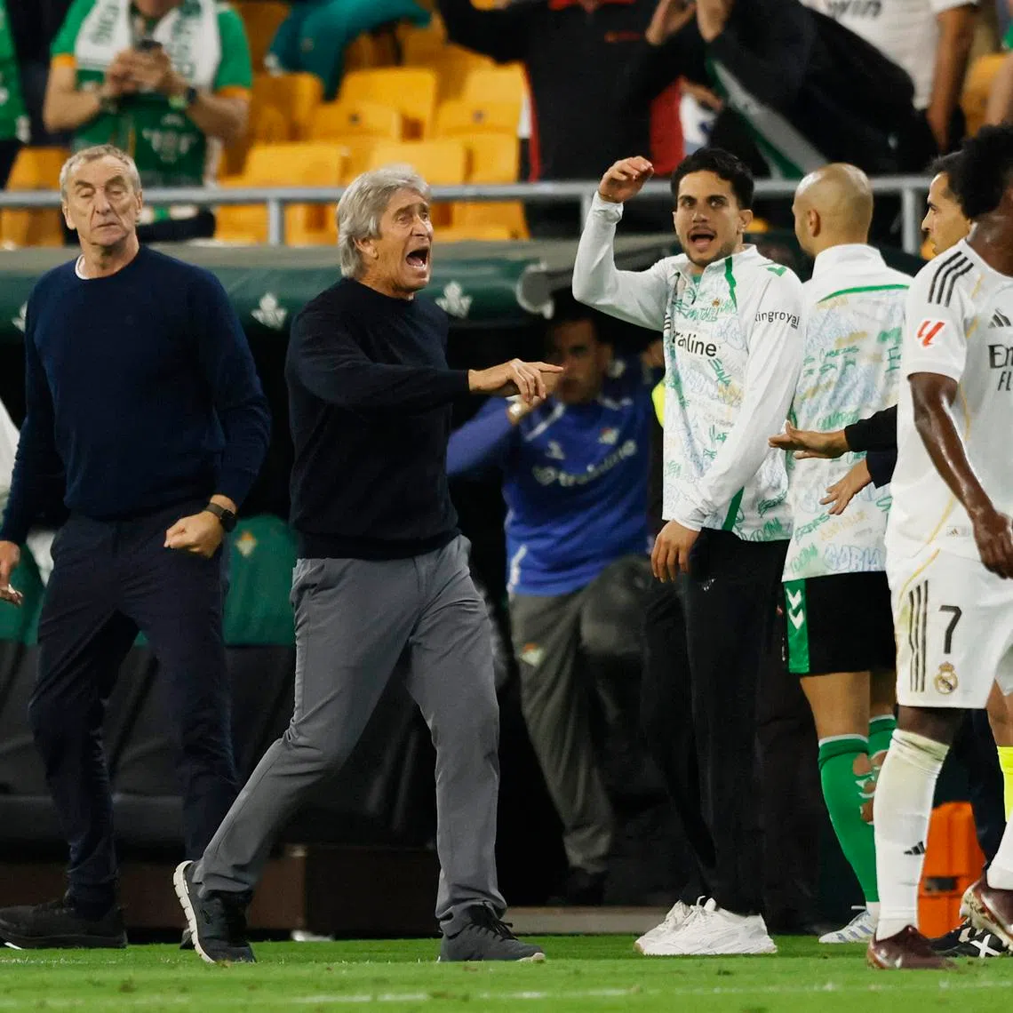 Soccer Football - LaLiga - Real Betis v Real Madrid - Estadio de La Cartuja, Seville, Spain - April 24, 2026 Real Betis coach Manuel Pellegrini reacts after Hector Bellerin scores their first goal REUTERS/Marcelo Del Pozo