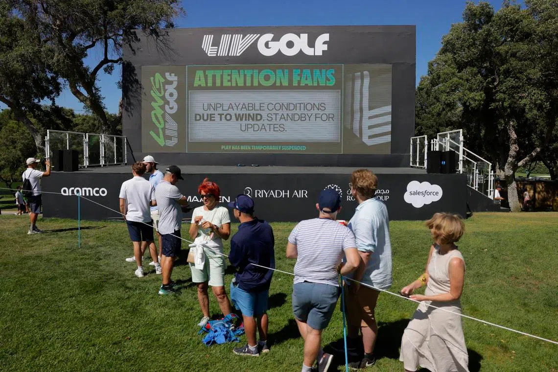 Golf - LIV Golf - Andalucia - Real Club Valderrama, Sotogrande, Spain - July 11, 2025 General view as a big screen displays a message after play is suspended due to a weather delay during the first round REUTERS/Jon Nazca