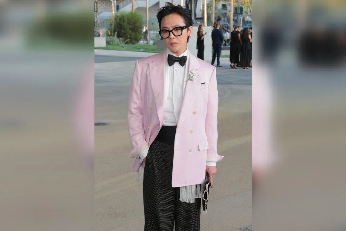 G-Dragon’s agency apologises over offensive wording on stage outfit