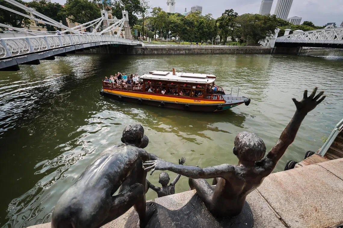 The First Generation sculpture by Singaporean sculptor Chong Fah Cheong near Cavenagh Bridge along the Singapore River on June 24, 2026.