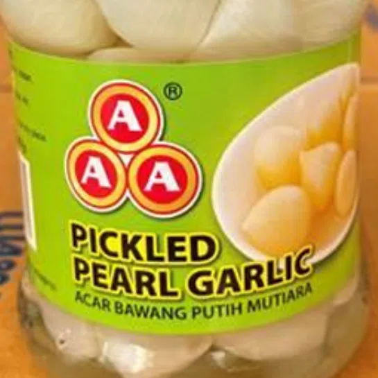 The jars of Pickled Pearl Garlic (230g) originate from Thailand and are imported by Sinhua Hock Kee Trading.