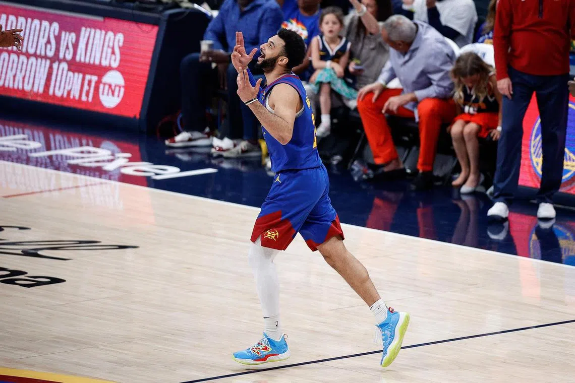 Denver Nuggets guard Jamal Murray reacting after a play in the third quarter against the Minnesota Timberwolves during Game 1 of the 2023 NBA play-offs at Ball Arena on Sunday. He had  24 points, eight rebounds and eight assists as the Nuggets won  109-80.
