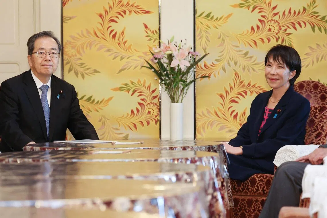 Japan's Liberal Democratic Party president Sanae Takaichi (right) and Komeito Party leader Tetsuo Saito attending a meeting of party leaders in Tokyo on Oct 10.