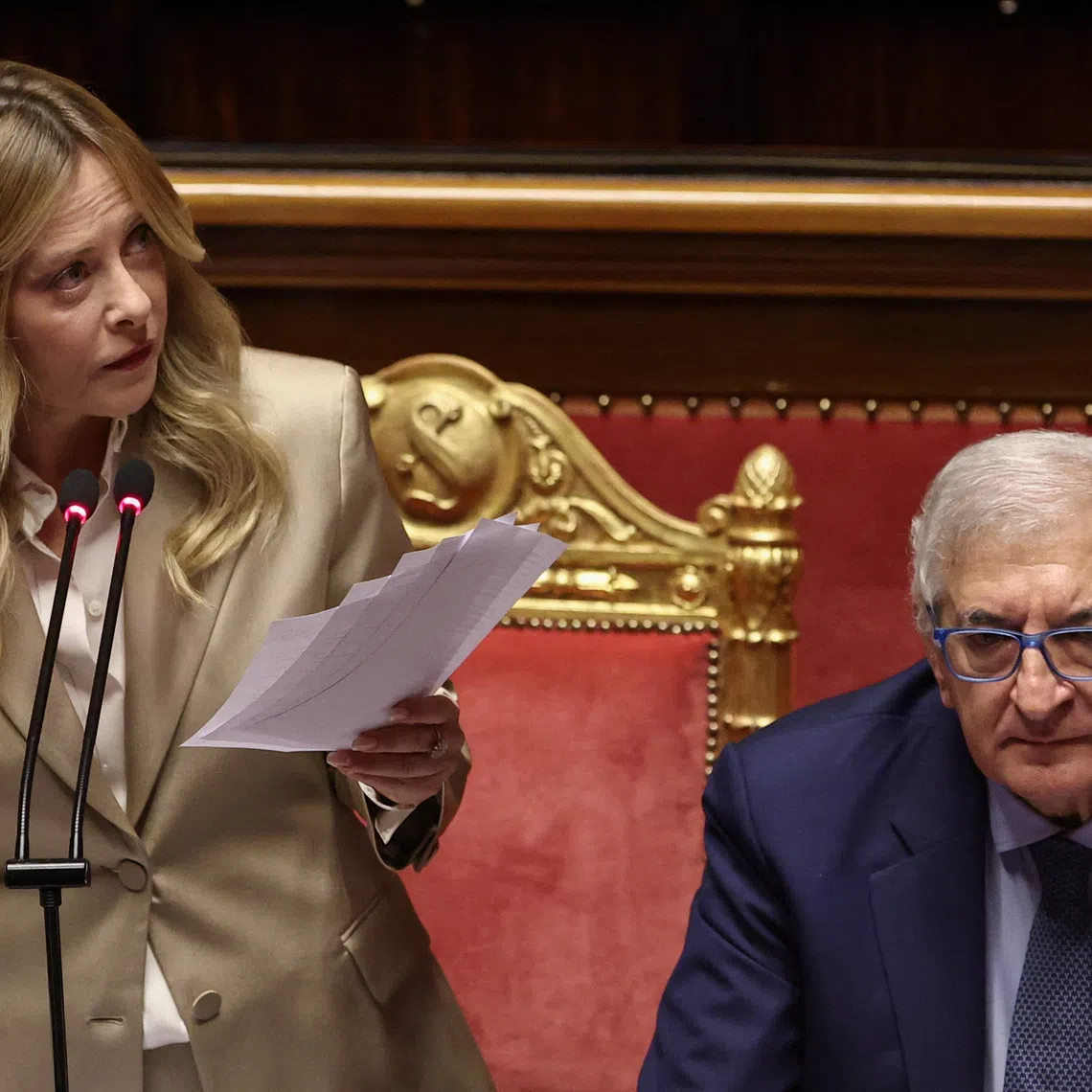 Italian Prime Minister Giorgia Meloni speaks while holding papers during an address to the Senate ahead of a European Union summit, in Rome, Italy, October 14, 2026. REUTERS/Francesco Fotia