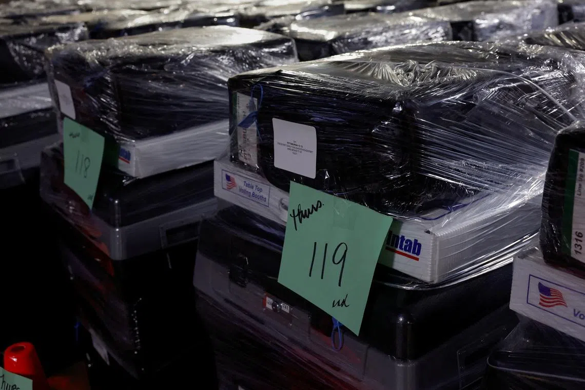 FILE PHOTO: Wrapped voting machines wait for delivery inside the Allegheny County Elections Warehouse in Pittsburgh, Pennsylvania, U.S., October 30, 2024. REUTERS/Shannon Stapleton/File Photo