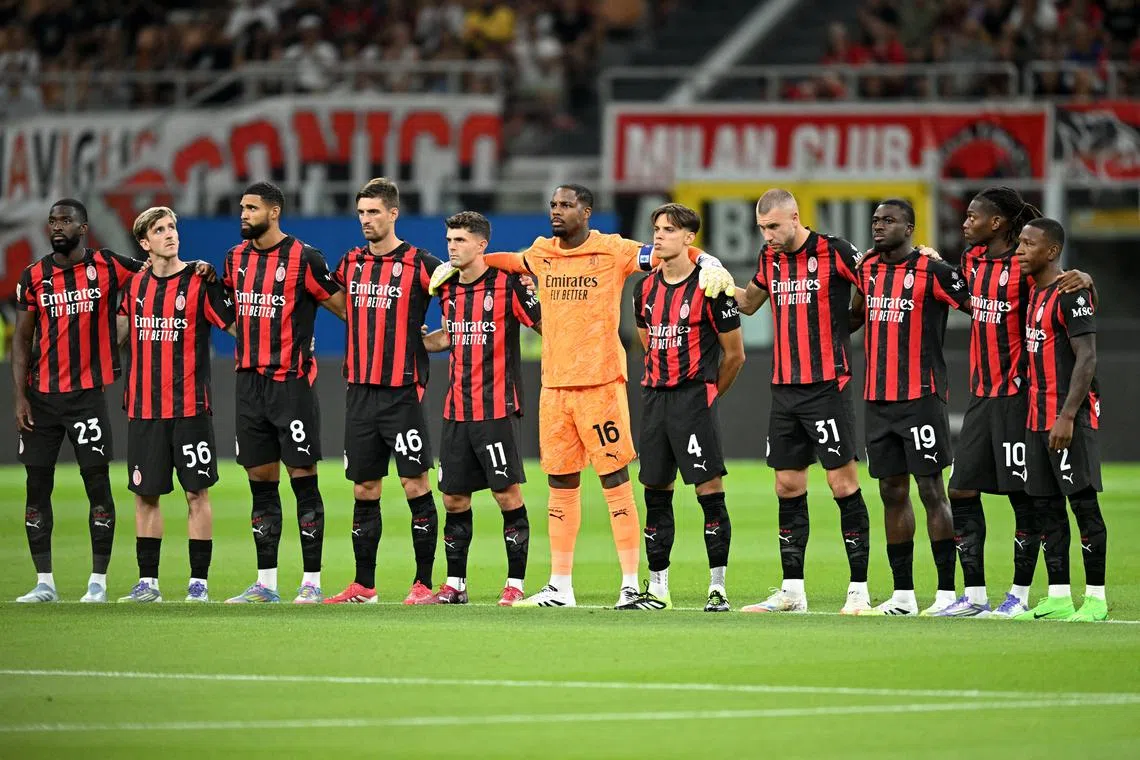 FILE PHOTO: Soccer Football - Coppa Italia - AC Milan v Bari - San Siro, Milan, Italy - August 17, 2025 AC Milan players line up before the match REUTERS/Daniele Mascolo/File Photo