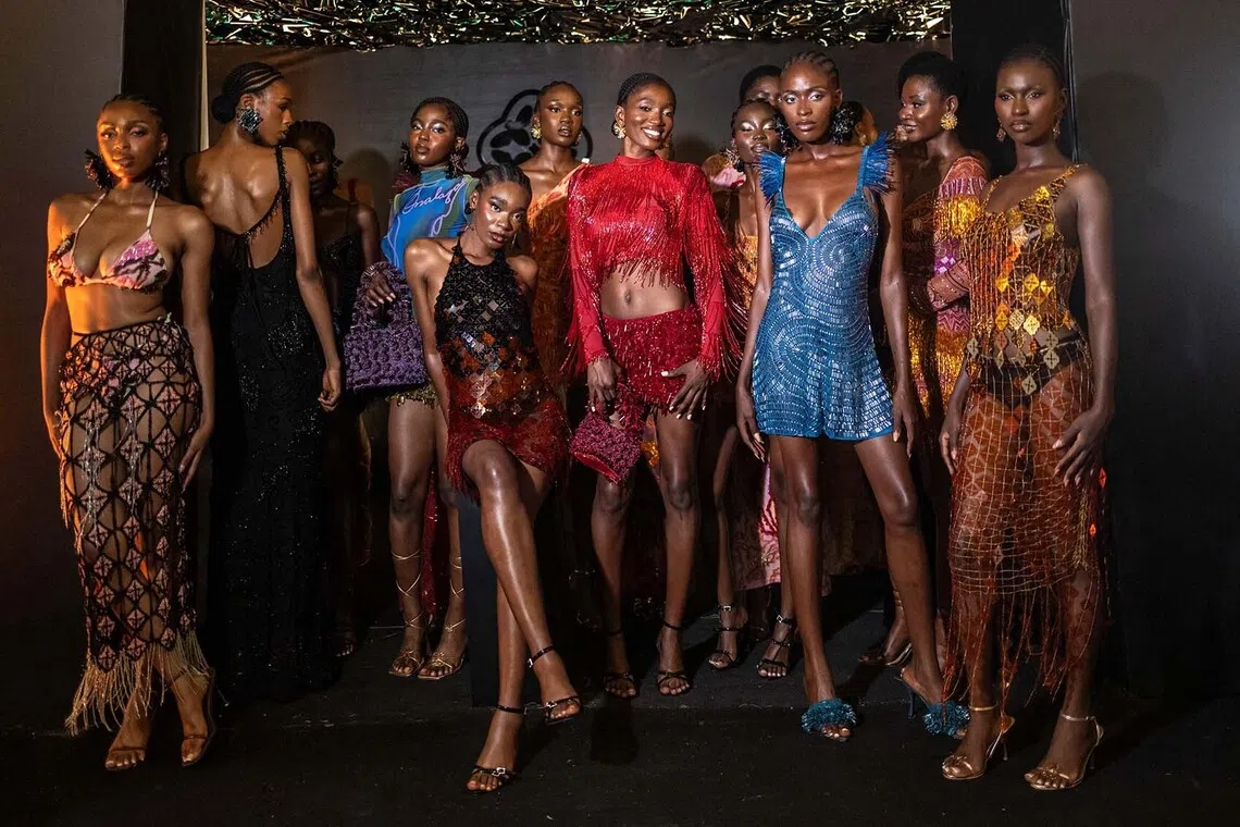 Models posing for a photograph during a cocktail after a private fashion show to launch the SS26 collection by Nigerian designer Kanyinsola Onalaja at Onalaja brand during Lagos Fashion Week in Lagos, on Oct 29, 2025. 