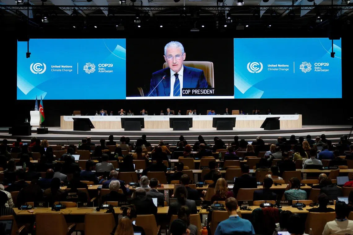 Developed nations should pay US$300 billion (S$401 billion) a year by 2035 to help poorer countries deal with climate change, according to a new draft deal  from UN climate talks published early on Nov 24.