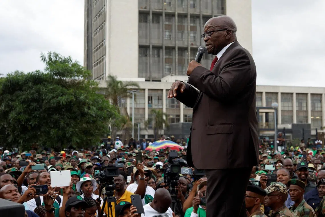FILE PHOTO: Former South African President Jacob Zuma speaks to supporters of the uMkhonto weSizwe Party outside the High Court in Durban, South Africa, March 27, 2024. REUTERS/Rogan Ward/File Photo