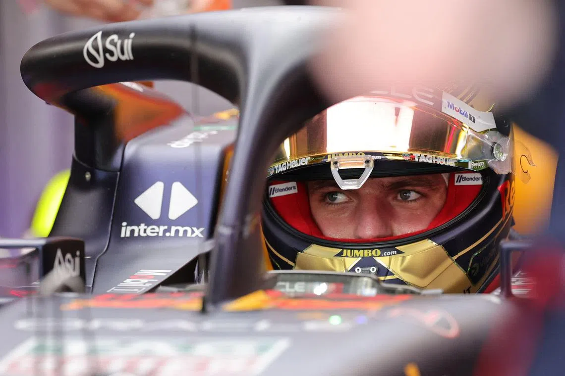 Red Bull Racing's Dutch driver Max Verstappen sits in his car during the third practice session for the Abu Dhabi Formula One Grand Prix at the Yas Marina Circuit in the Emirati city on November 25, 2023. (Photo by Giuseppe CACACE / AFP)