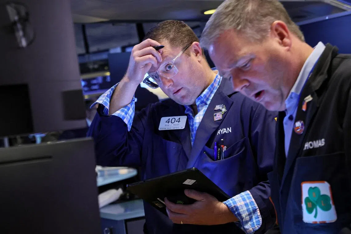 Traders work on the floor of the New York Stock Exchange (NYSE) in New York City, U.S., June 22, 2023.  REUTERS/Brendan McDermid    