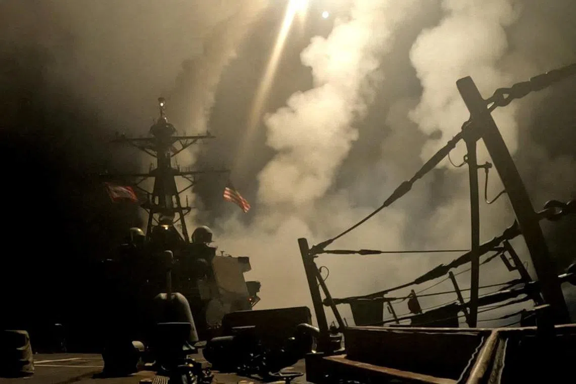 A ship fires missiles at an undisclosed location, after U.S. President Donald Trump launched military strikes against Yemen's Iran-aligned Houthis on Saturday over the group's attacks against Red Sea shipping, in this screengrab obtained from a handout video released on March 15, 2025. U.S. Central Command/Handout via REUTERS THIS IMAGE HAS BEEN SUPPLIED BY A THIRD PARTY     TPX IMAGES OF THE DAY     
