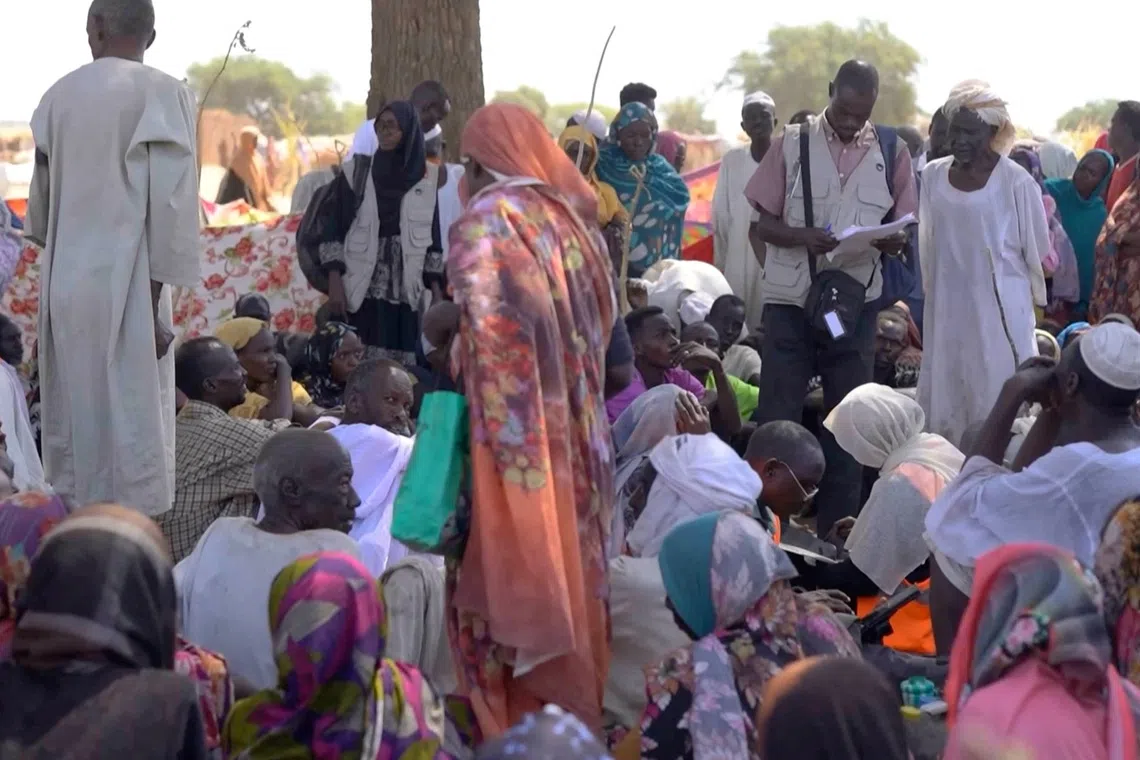 Displaced Sudanese gathering in Tawila after fleeing al-Fashir city on Oct 29.
