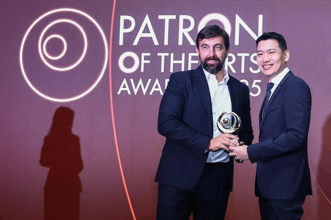 Acting Minister for Culture, Community and Youth David Neo (right) presenting the Distinguished Patron of the Arts Awards to Mr Roger Parellada on Aug 20.