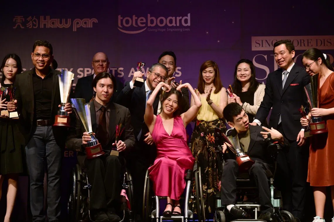 (Front, from left) Sportsman of the Year Toh Wei Soong, Sportswoman of the Year Yip Pin Xiu, Sportsboy of the Year Aloysius Gan, and Sportsgirl of the Year Janelle Tong
with other award recipients at the Singapore Disability Sports Awards on Nov 20. Also present were Minister for Culture, Community and Youth Edwin Tong (behind Yip),
Senior Parliamentary Secretary Eric Chua (second from right), and Yip’s coach Mick Massey (behind Toh), Coach of the Year (High Performance).