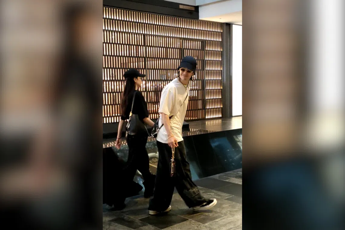 Van Ness Wu seen with a woman believed to be his wife Emi Aramaki at Marina Bay Sands on Aug 13.