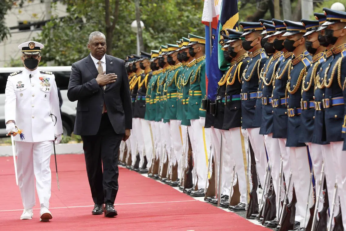 US Defense Secretary Lloyd Austin reviewing the guard of honour at the Armed Forces of the Philippines’ headquarters in Manila on Feb 2, 2023. 