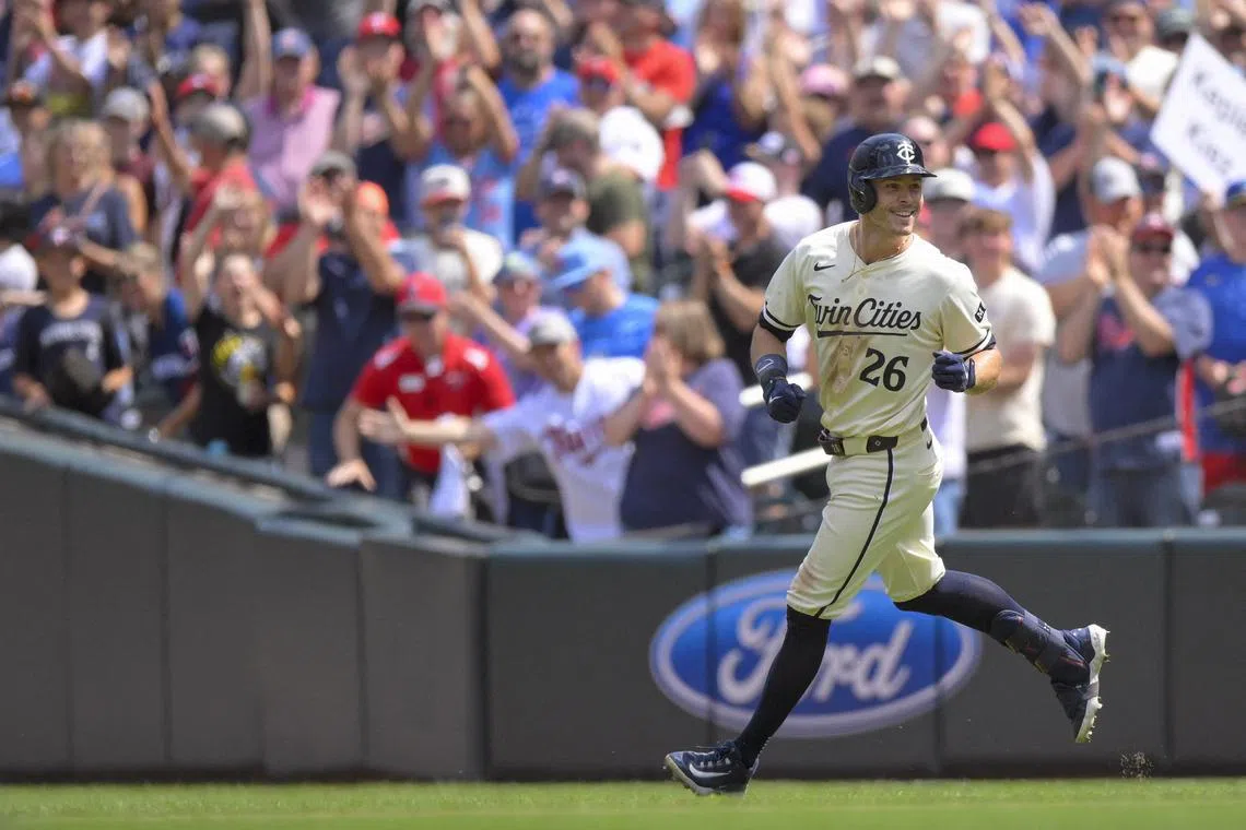 FILE PHOTO: Jul 24, 2024; Minneapolis, Minnesota, USA;  Minnesota Twins outfielder Max Kepler (26) celebrates his game-winning RBI single against the Philadelphia Phillies during the ninth inning at Target Field. Mandatory Credit: Nick Wosika-USA TODAY Sports/File Photo