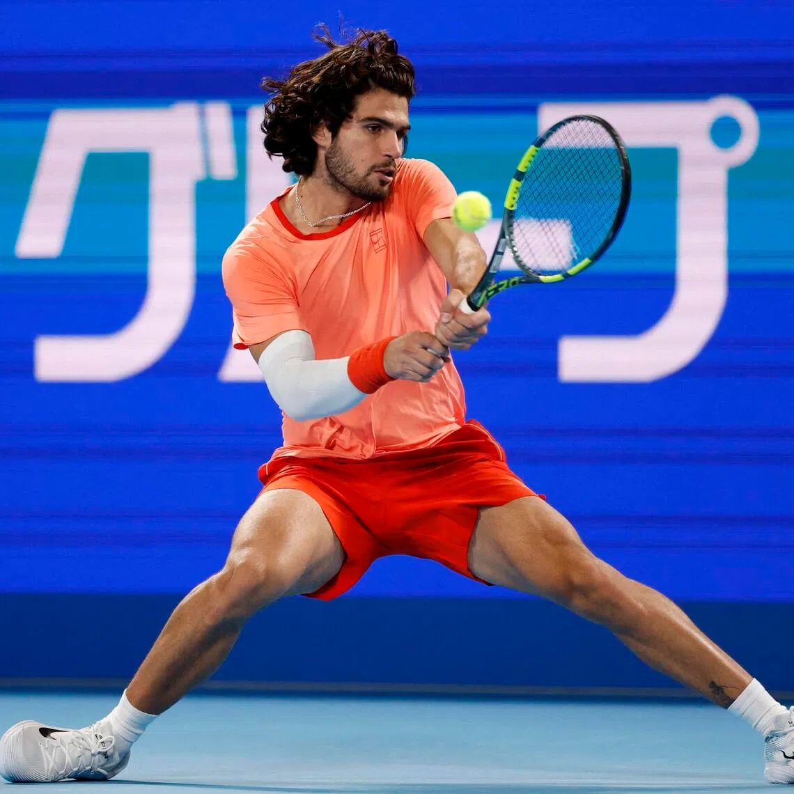 Spain’s Carlos Alcaraz returning to his compatriot Jaume Munar in their Japan Open semi-final at Ariake Coliseum in Tokyo on Oct 5.