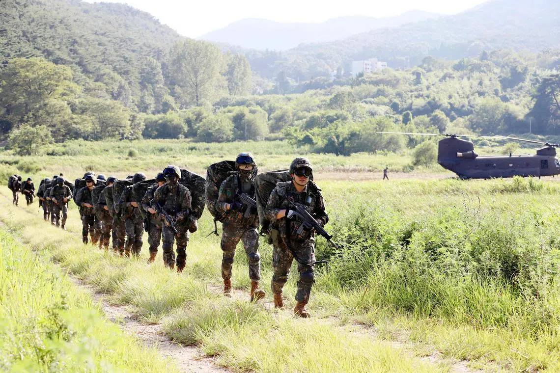 In South Korea, there has been talk of whether to conscript women as well.